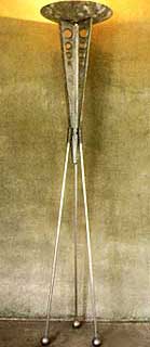 The Saturn Floor Lamp is a 'must-have' for the celestial enthusiast.